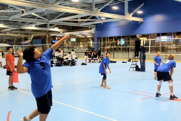 Lui Trimble serving a volley.